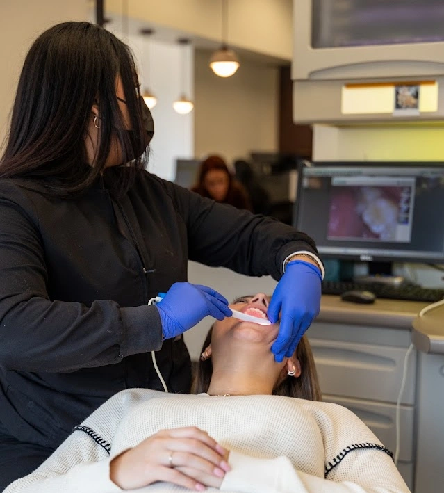 patient smile after treatment from cosmetic dentist in Carrollton